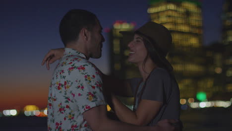 Romantic-Couple-With-Manhattan-Skyline-At-Dusk-In-Background