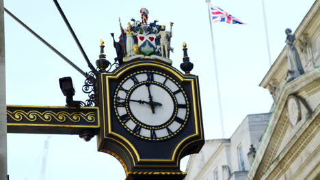 LONDON---MAY,-2017:-Clock-on-the-outside-of-the-Royal-Exchange-building,-Cornhill,-London,-EC3