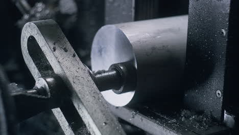Technician-Sets-Steel-Pipe-in-Professional-Machine