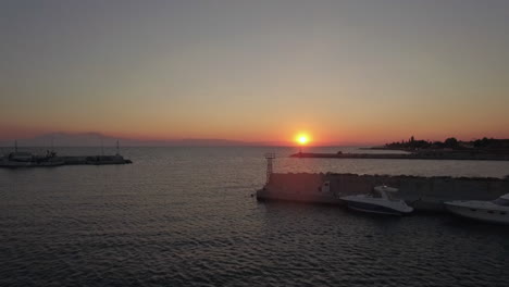 Aerial-scene-of-quay-and-sea-at-sunset