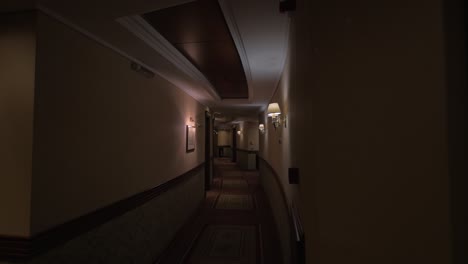 View-of-round-hotel-corridor-with-lighted-lamps