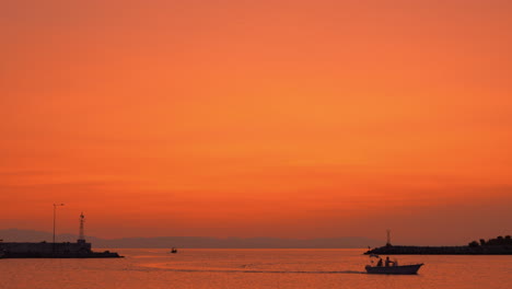 Evening-marine-scene-with-sailing-motor-boats