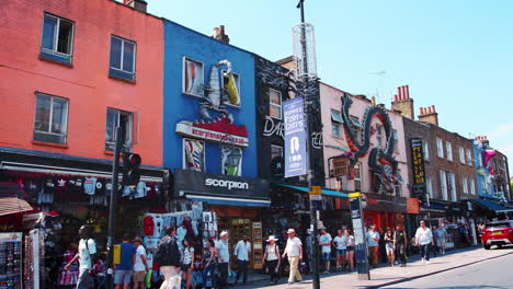 LONDON---MAY,-2017:-Pedestrians-walking-past-shops-on-Camden-High-Street-near-Camden-Lock-market,-London,-NW1