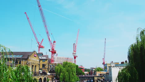 LONDON---MAY,-2017:-Construction-site-cranes-over-Camden-Lock,-Camden-Town,-London,-NW1