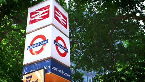LONDON---MAY,-2017:-Overground-and-Underground-railway-station-sign,-London-Euston,-London,-NW1,-detail