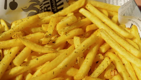 Eating-appetizing-crunchy-French-fries