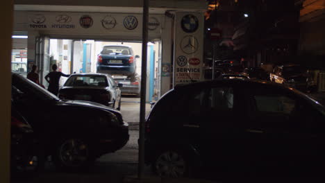Street-with-car-service-station-at-night-Greece