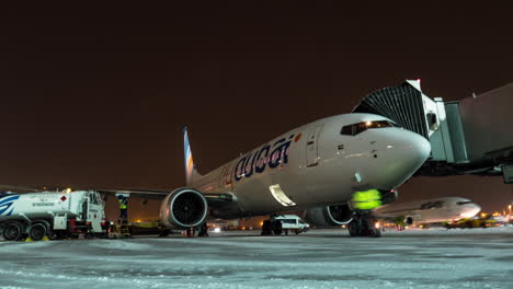 Timelapse-of-boarding-FlyDubai-plane-and-loading-luggage-at-winter-night