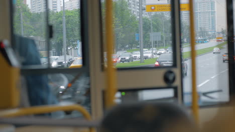 View-through-bus-windscreen-to-car-traffic-on-the-road-Moscow