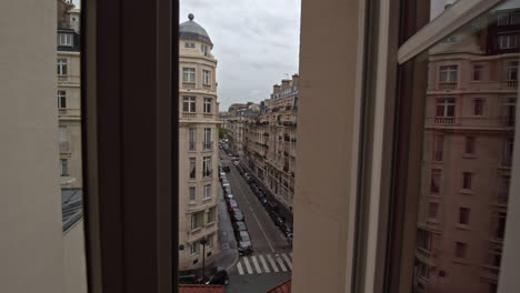 Timelapse-of-traffic-in-Parisian-street-view-through-window