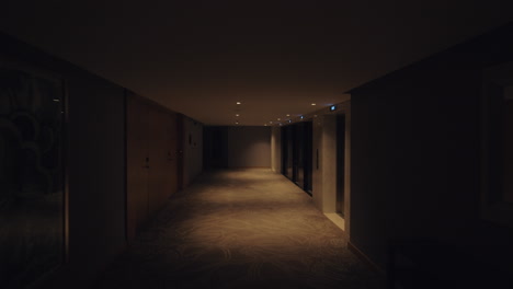 Walking-in-hotel-hallway-view-in-dim-light