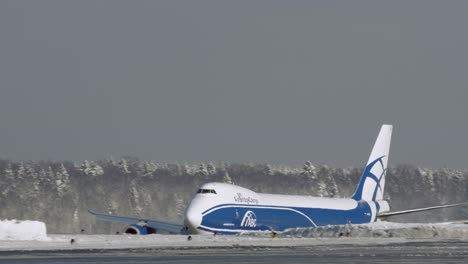 Cargo-Boeing-747-taking-off-view-at-winter