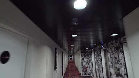 Walking-along-hallway-of-CitizenM-hotel-in-Paris