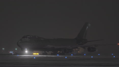 Sky-Gates-cargo-Boeing-747-arrival-at-winter-night