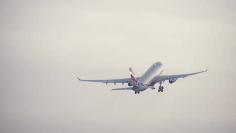 Airplane-of-Aeroflot-airline-taking-off-and-gaining-height-in-the-sky