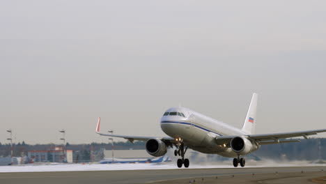 Aeroflot-aircraft-Dobrolet-A320-taking-off-winter-view-Moscow