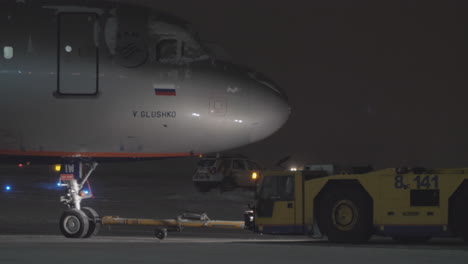 Pushback-of-Airbus-A320-at-winter-night