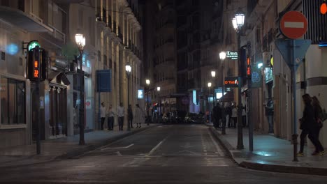 Street-view-in-evening-Alicante-Spain-People-crossing-the-road