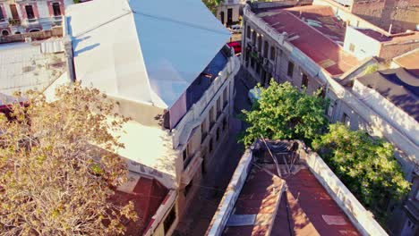 Drone-dolly-in-shot-of-the-Concha-Palace-on-the-cobblestone-streets-of-the-Concha-y-Toro-neighborhood,-Santiago-Chile