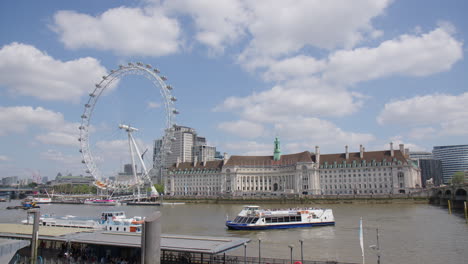 London-Eye-And-County-Hall-On-South-Bank-Of-River-Thames-In-London,-United-Kingdom