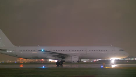 Passenger-jet-plane-on-a-wet-runway