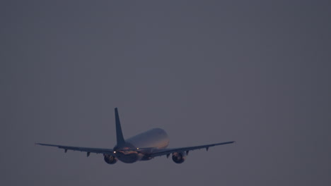 Plane-closing-its-landing-gear-after-take-off