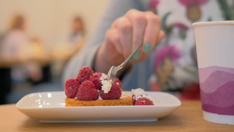 Eating-dessert-with-raspberries