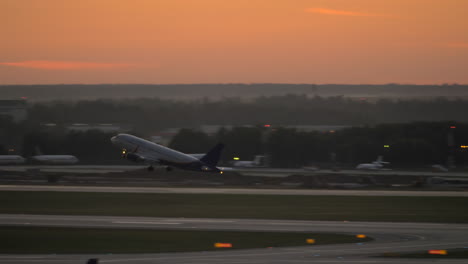 Airplane-take-off-in-the-evening