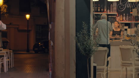 Cafe-inside-and-outside-in-night-city-Valencia-Spain