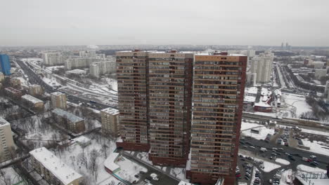 Three-multi-storey-residential-buildings-in-winter-urbanscape