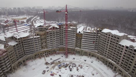 An-aerial-view-of-a-huge-winter-building-construction-zone