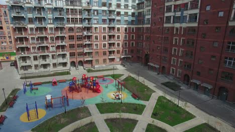 Aerial-shot-of-new-apartment-house-and-unfinished-residential-complex-Russia