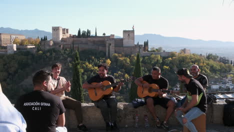 Gypsy-Musicians-Serenading-in-Front-of-Alhambra-Palace