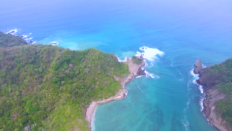 Aerial-footage-flying-over-an-inlet-between-islands-in-Costa-Rica's-Tortuga-Islands-archipelago-during-summer