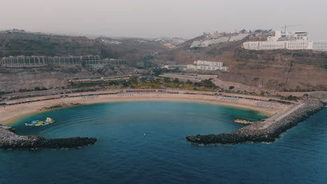 Amadores-Beach,-Mogan,-Gran-Canaria:-Unique-Experience-from-the-Heights-with-Cinematic-Aerial-Shot