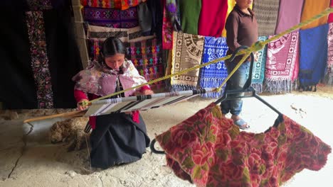 A-Tzotzil-Mayan-woman-weaving-a-textile-in-the-region-of-San-Cristobal-de-las-Casas,-Chiapas-state