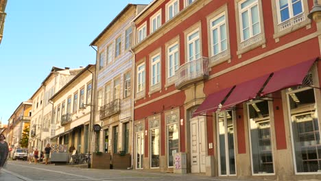 People-Walking-In-The-Street-Of-Braga-Old-Town-In-Portugal