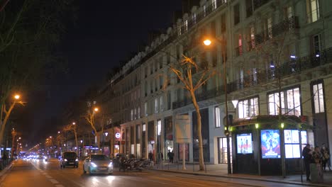 Street-at-night-typical-Hausmmn-style-boulevard-in-Paris,-France