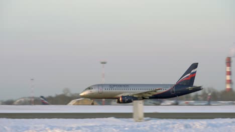 Jetliner-of-Aeroflot-taxiing-on-runway-winter-view-in-Russia
