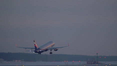 Airplane-departure-in-the-dusk-Aeroflot-aircraft-taking-off-Russia