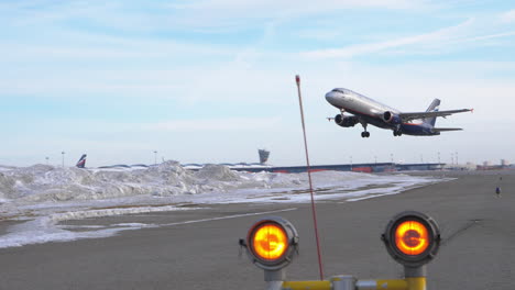 Aeroflot-aircraft-take-off-and-climb-in-blue-sky