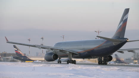 Aeroflot-aircraft-A330-taxiing-in-Moscow-airport-winter-view