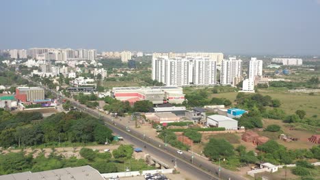 Rajkot-city-aerial-view-Drone-camera-Cosmoplex-talkies-are-visible-and-big-four-wheelers-are-also-going-on-the-road