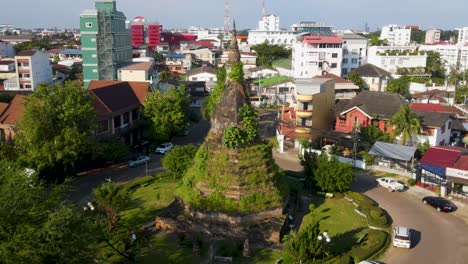 Aerial-View-Of-That-Dam-On-Roundabout-In-Vientiane,-Laos-On-Sunny-Day