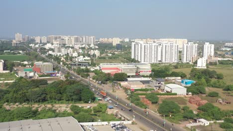 Rajkot-city-aerial-view-Drone-camera-is-going-over-the-showroom-and-many-cars-are-visible-in-the-showroom