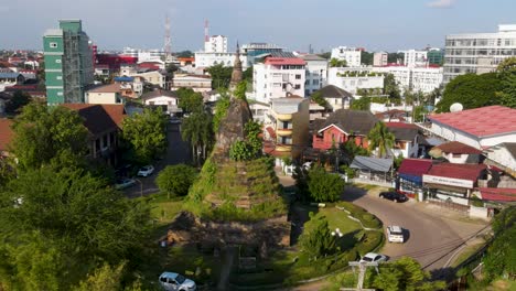 Aerial-View-Of-That-Dam-On-Roundabout-In-Vientiane,-Laos-On-Sunny-Day