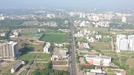Rajkot-city-aerial-view-Drone-camera-is-going-over-talkies-and-high-rise-buildings-are-around