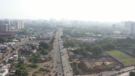 Rajkot-city-aerial-view-The-camera-is-moving-over-a-large-circle,-and-large-plots-are-also-visible