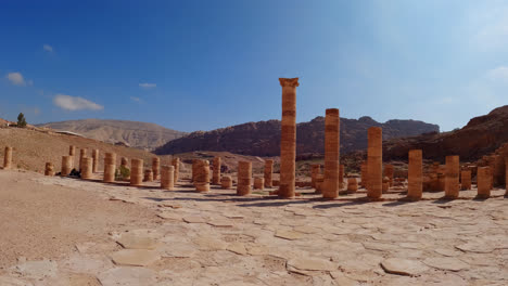 Wide-angle-push-in-to-remnant-spire-columns-of-old-ancient-structure-in-Rose-City-petra