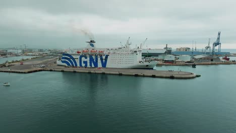 Aerial-establishing-shot-of-a-large-GNV-freight-and-passenger-cruise-ship-in-Sete